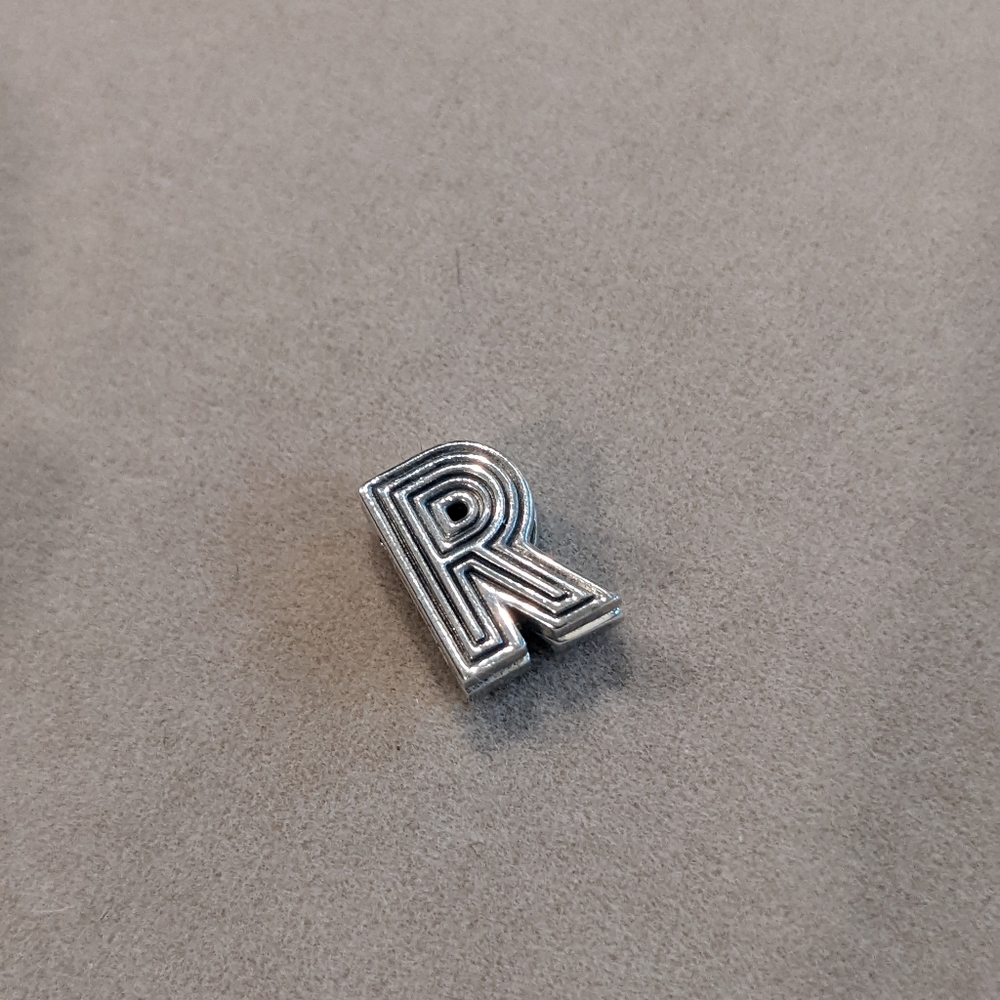 PANDORA Reflexions collection letter clip on charm